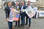 Freuen sich aufs Fest (v. r.): Benjamin Krysmann, Pressesprecher des Erzbischöflichen Generalvikariats, Jens Reinhardt, Leiter des Amtes für Öffentlichkeitsarbeit und Stadtmarketing und Pressereferent der Stadt Paderborn, Bürgermeister Michael Dreier und Hans-Otto Bröckling, Vorsitzender der Schaustellervereinigung Paderborn, stellten am Freitag das diesjährige Libori-Programm vor.© Stadt Paderborn