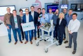 BU: Das AcRoSS-Konsortium beim Projektabschluss im Smart Data Forum 
in Berlin, wo künftig die Industrie-Exponate für Besucher ausgestellt 
werden. 
Foto: Fraunhofer IEM