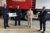 Landrat Jürgen Müller (r.) zusammen mit der Kreisdirektorin Cornelia Schöder (Minden-Lübbecke), Kreis-Brandmeister Bernd Kröger (Herford) und dem stellvertretenden Kreisbrandmeister Thomas Kutchaty (Minden-Lübbecke).
