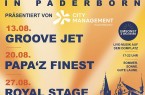 Gelb-blaues Veranstaltungsplakat „Donnerstags in Paderborn“ mit Live-Musik-Terminen am 13., 20. und 27. August auf dem Domplatz.
